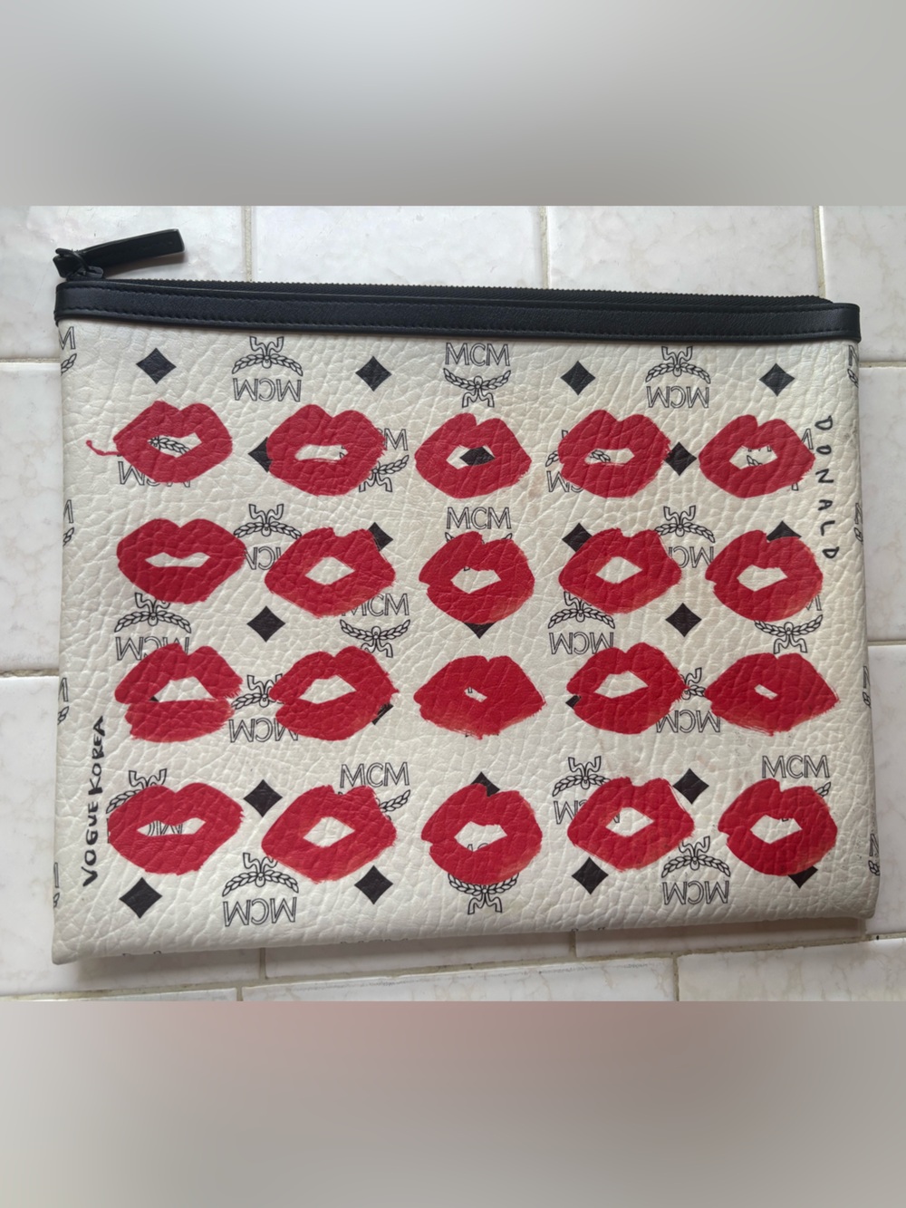 MCM x Donald White Leather Clutch with Red Lip Print